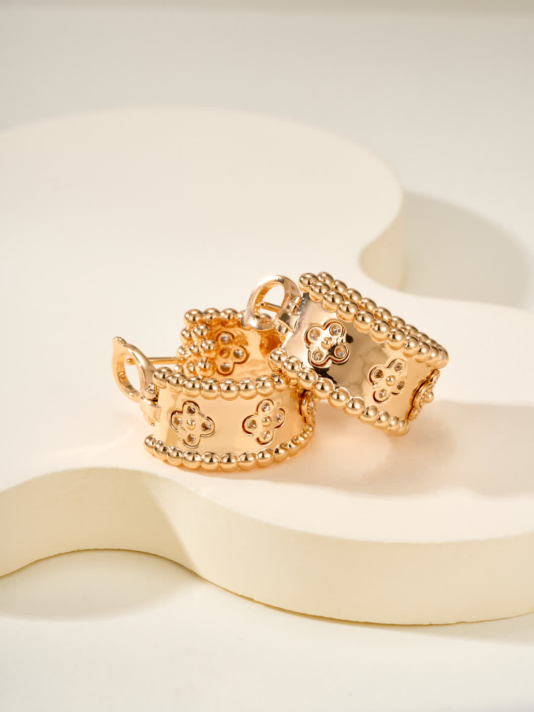 Van Cleef & Arpels Elegant Gold and Silver Hoop Earrings with Diamond Accents